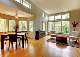 Fantastic modern living room home interior. Dining room. Huge green bright room with modern furniture.