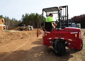 Lampert Lumber employee operation moving equipment