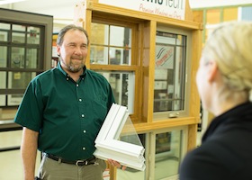 A lady showing a style of crown molding