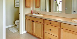 Large classic beautiful bathroom with double sink and shower.