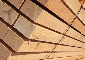 Stack of new wooden studs at the lumber yard