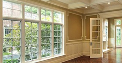 Dining room in new construction home with windowed doors