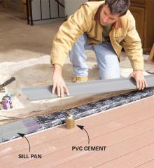 Man installing a Sill Pan
