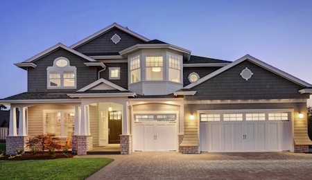 Beautiful exterior of modern new home at sunset ** Note: Soft Focus at 100%, best at smaller sizes