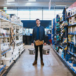 Worker-in-an-aisle-of-a-hardware-store