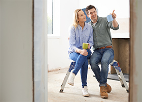 Couple-looking-at-renovated-property