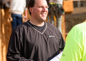 Man talking to employees